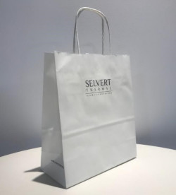 Kleine weiße Papiertüte